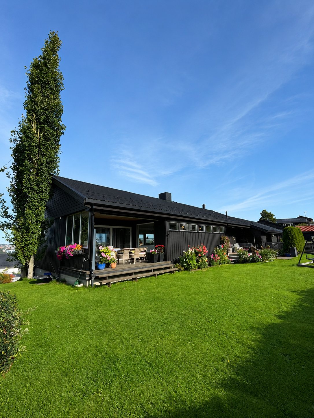 Breisynvegen 22: tilbygg med kjeller og forlenget stue